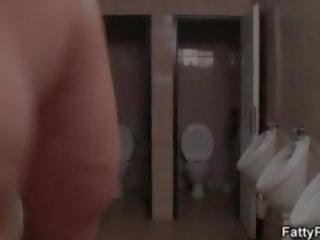 Fatty takes it from behind in the jemagat öňünde restroom